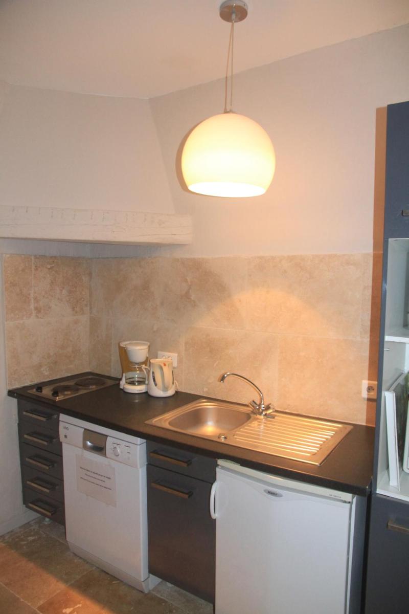 Cuisine ou kitchenette dans l'établissement Hotel du Soleil et Spa