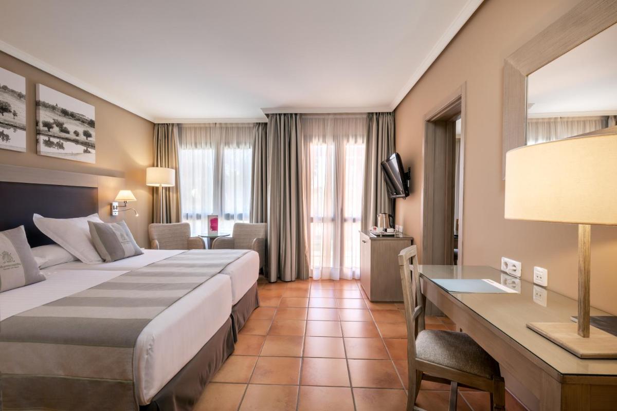 Cama o camas de una habitación en Barceló Montecastillo Golf
