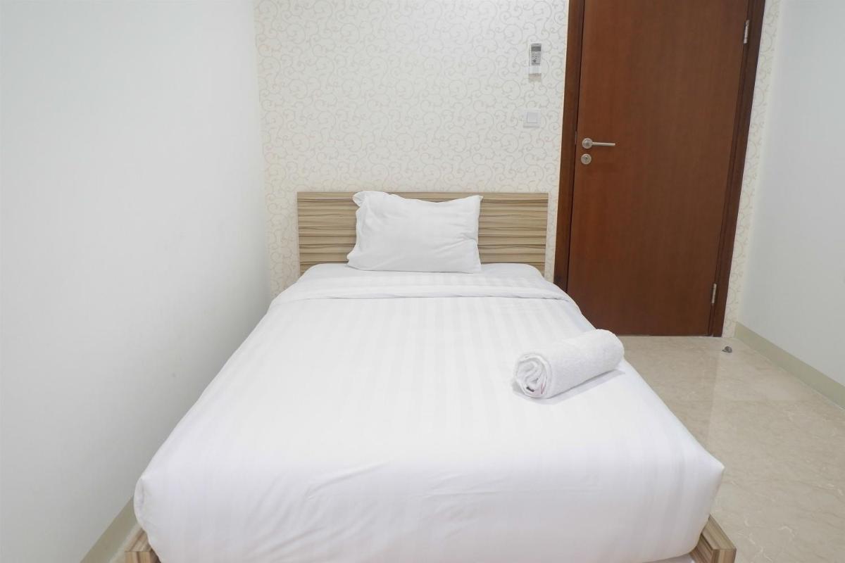Affordable 2BR At L'Avenue Apartment By Travelio - Housity