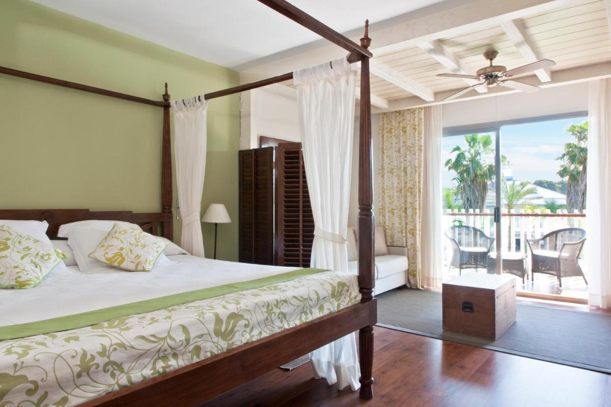 Cama o camas de una habitación en PortAventura Hotel Caribe - Includes unlimited access to PortAventura Park & 1 access to Ferrari Land