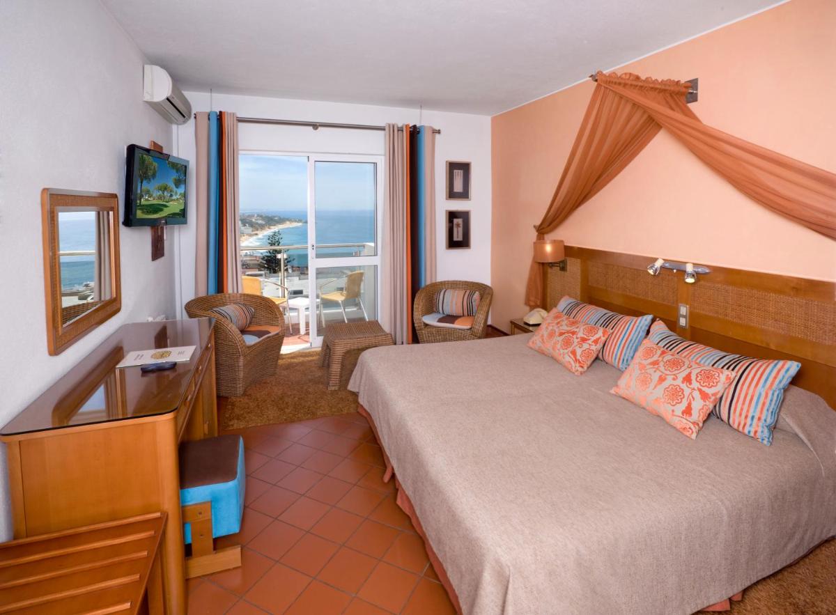 Uma cama ou camas num quarto em Hotel do Cerro