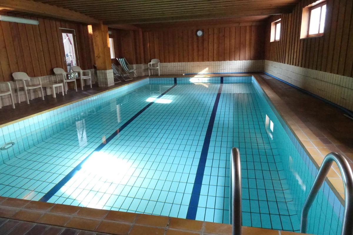Piscine de l'établissement Hotel-Spa & Restaurant Logis Domaine Langmatt ou située à proximité