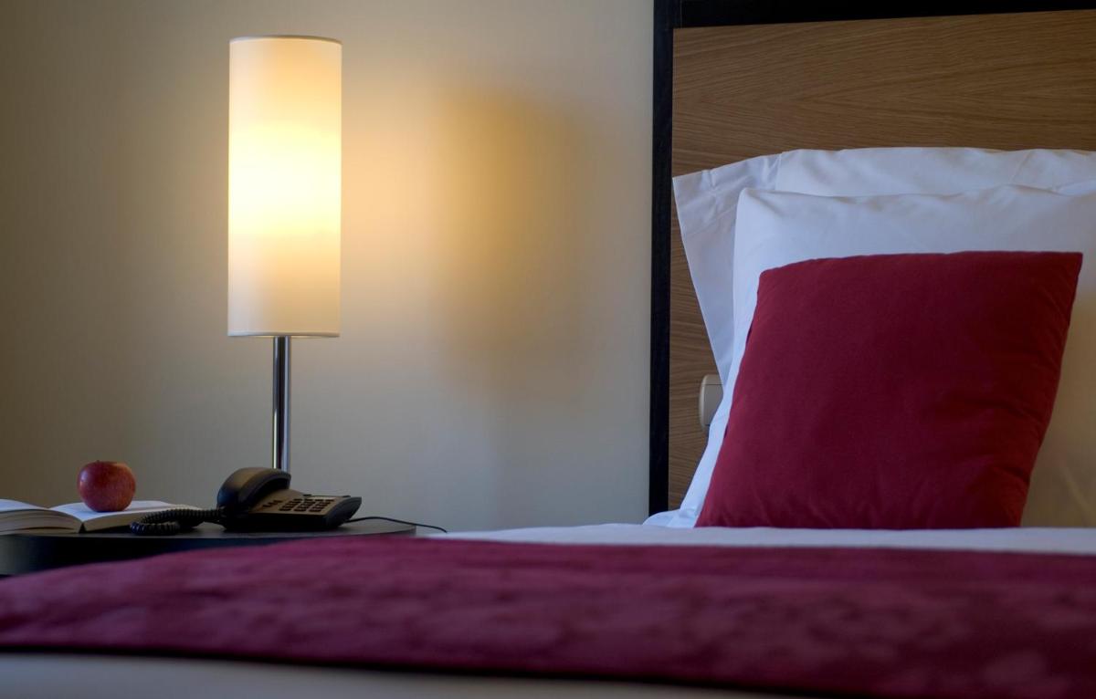 Uma cama ou camas num quarto em Pestana Casino Park Hotel & Casino