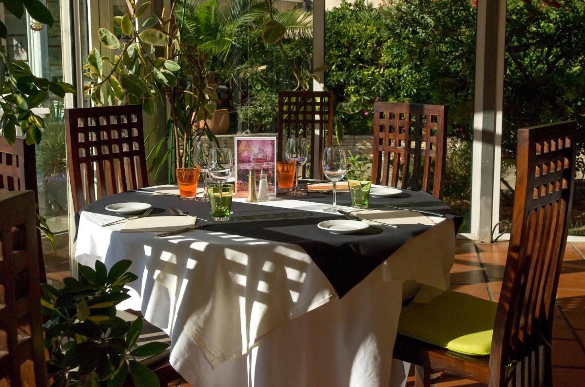 Jardin de l'établissement Hotel Le Phoebus Garden & Spa