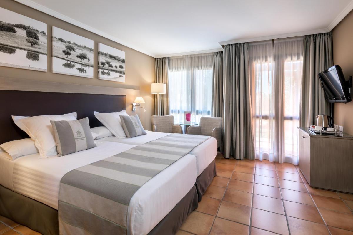 Cama o camas de una habitación en Barceló Montecastillo Golf
