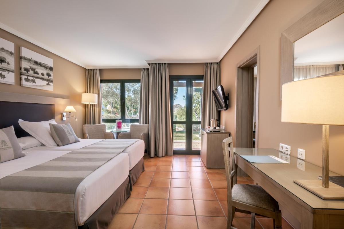 Cama o camas de una habitación en Barceló Montecastillo Golf