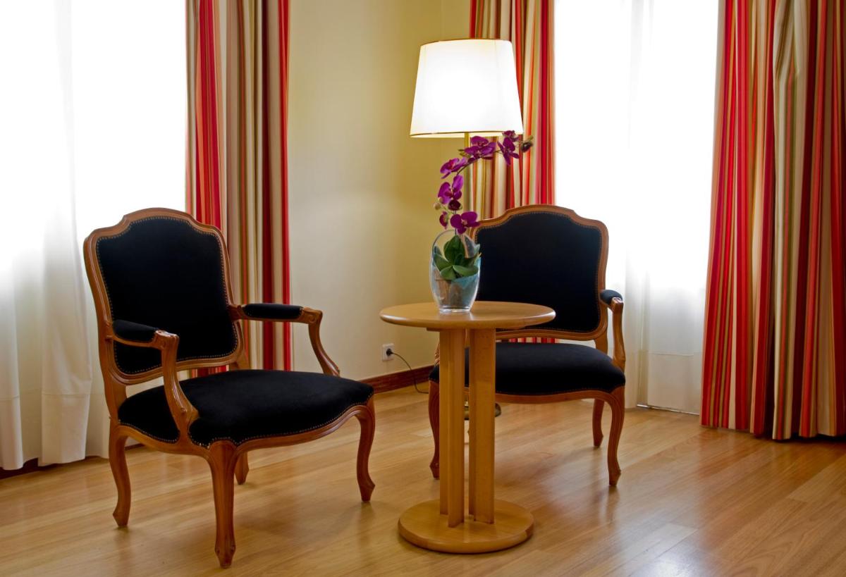 Uma área de estar em Hotel Quinta Bela S Tiago