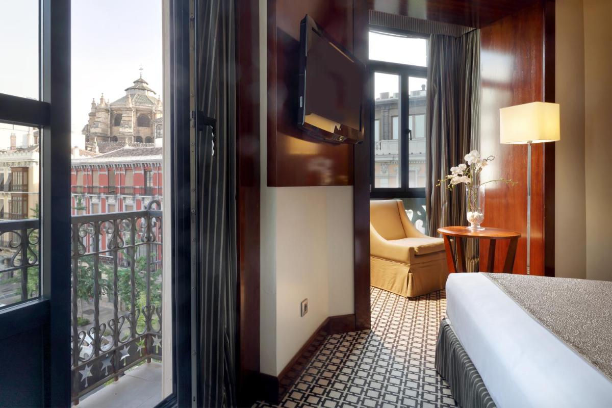 Cama o camas de una habitación en Eurostars Gran Via