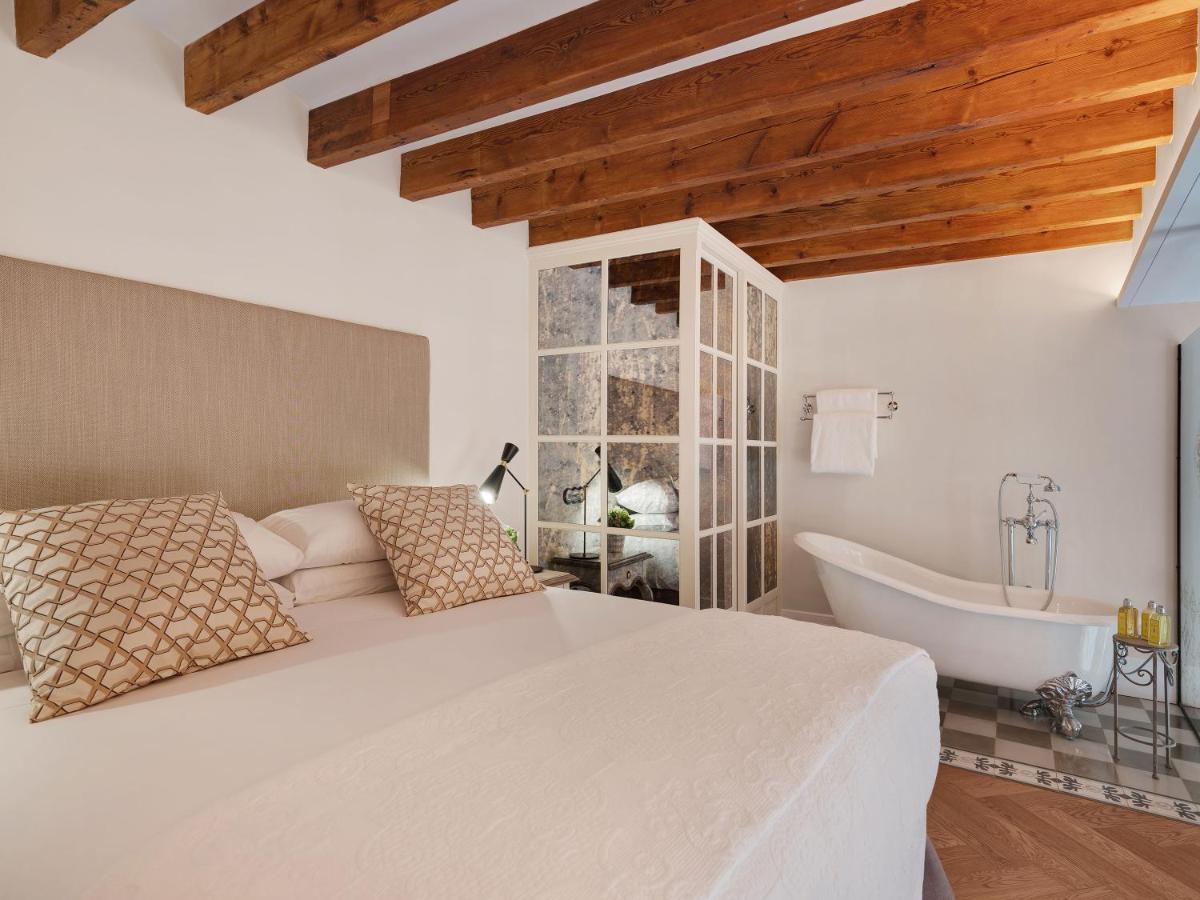 Cama o camas de una habitación en Hotel Gloria de Sant Jaume