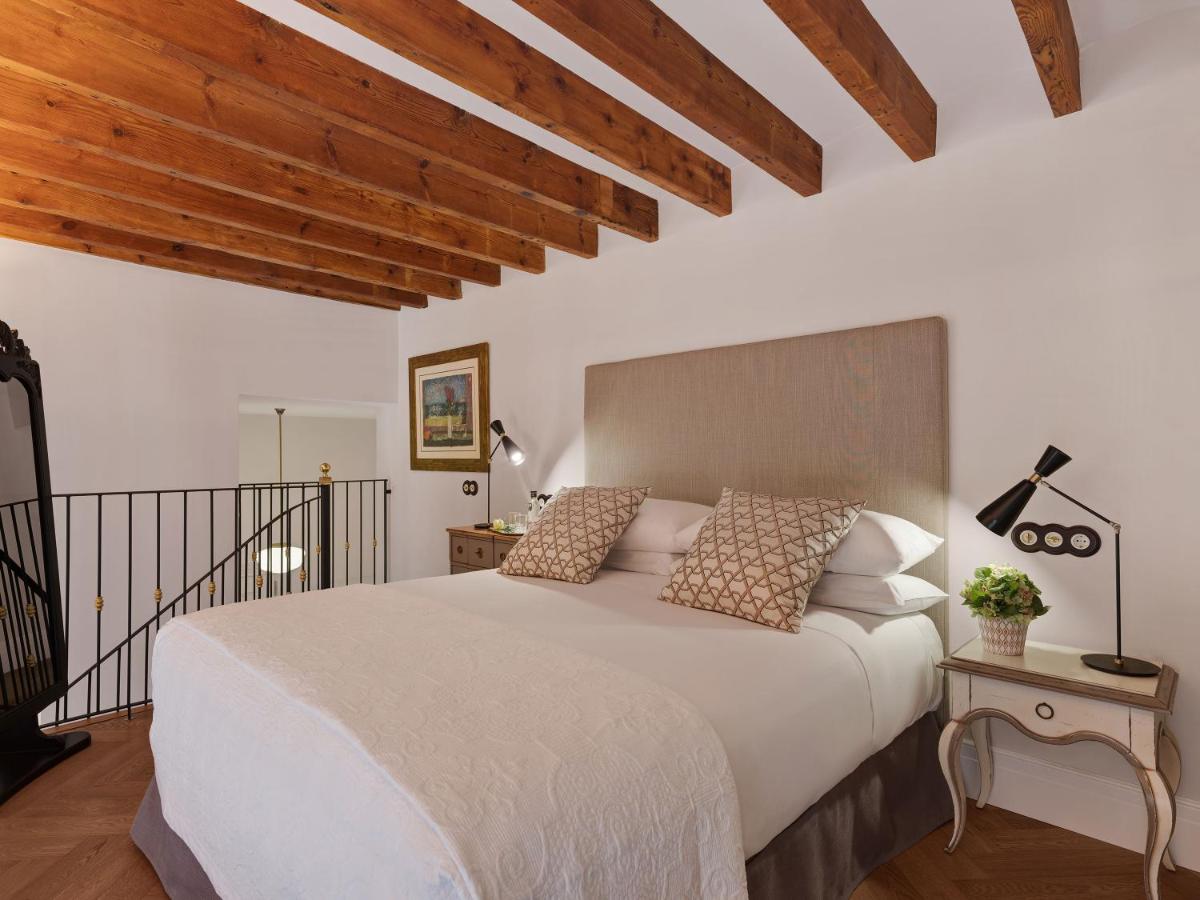 Cama o camas de una habitación en Hotel Gloria de Sant Jaume