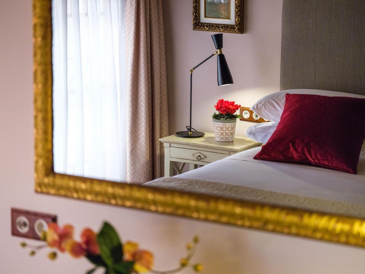 Cama o camas de una habitación en Hotel Gloria de Sant Jaume