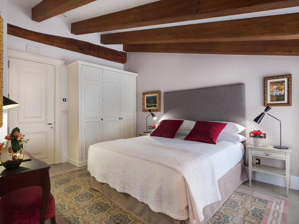 Cama o camas de una habitación en Hotel Gloria de Sant Jaume