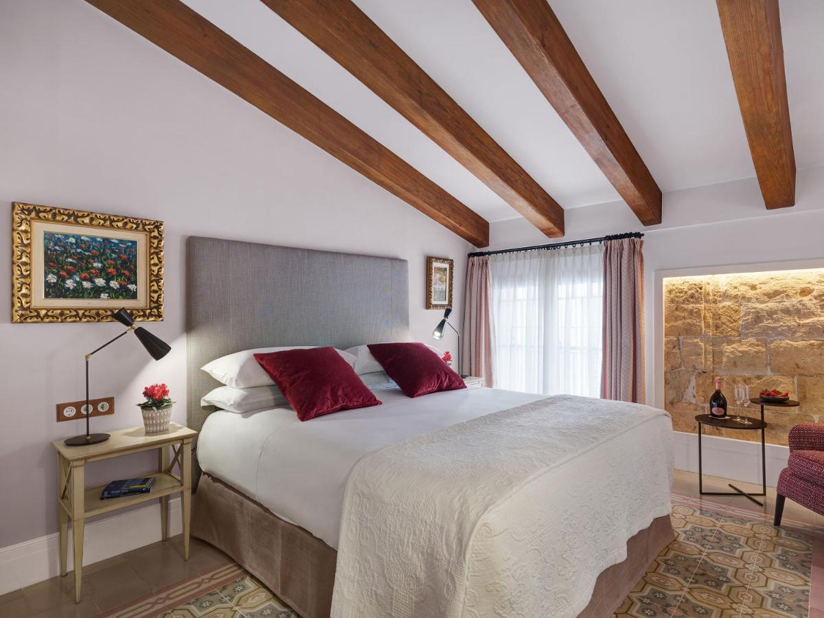 Cama o camas de una habitación en Hotel Gloria de Sant Jaume