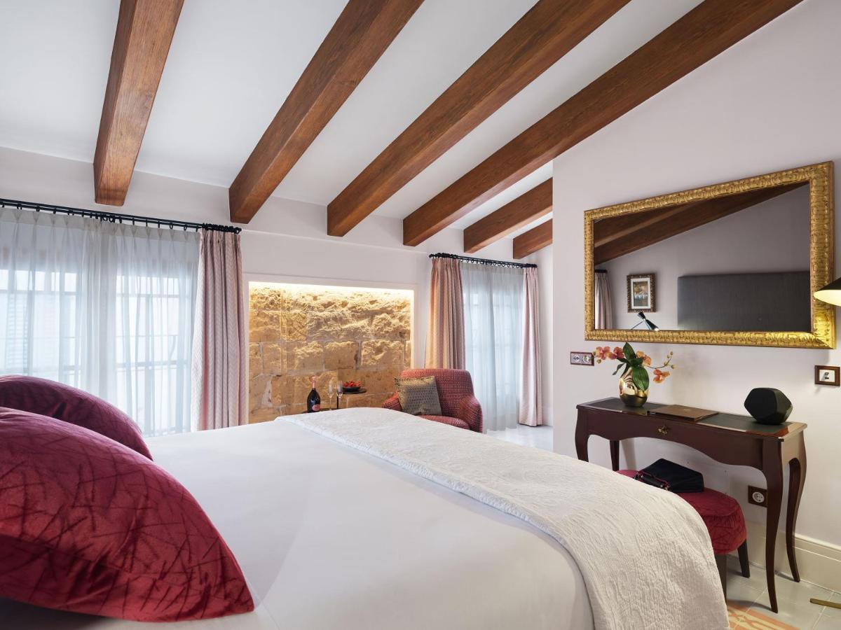 Cama o camas de una habitación en Hotel Gloria de Sant Jaume