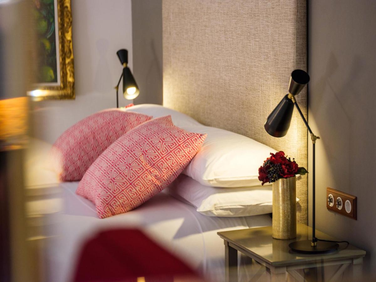 Cama o camas de una habitación en Hotel Gloria de Sant Jaume