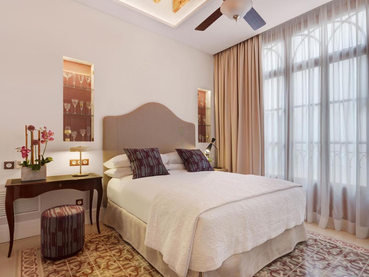 Cama o camas de una habitación en Hotel Gloria de Sant Jaume