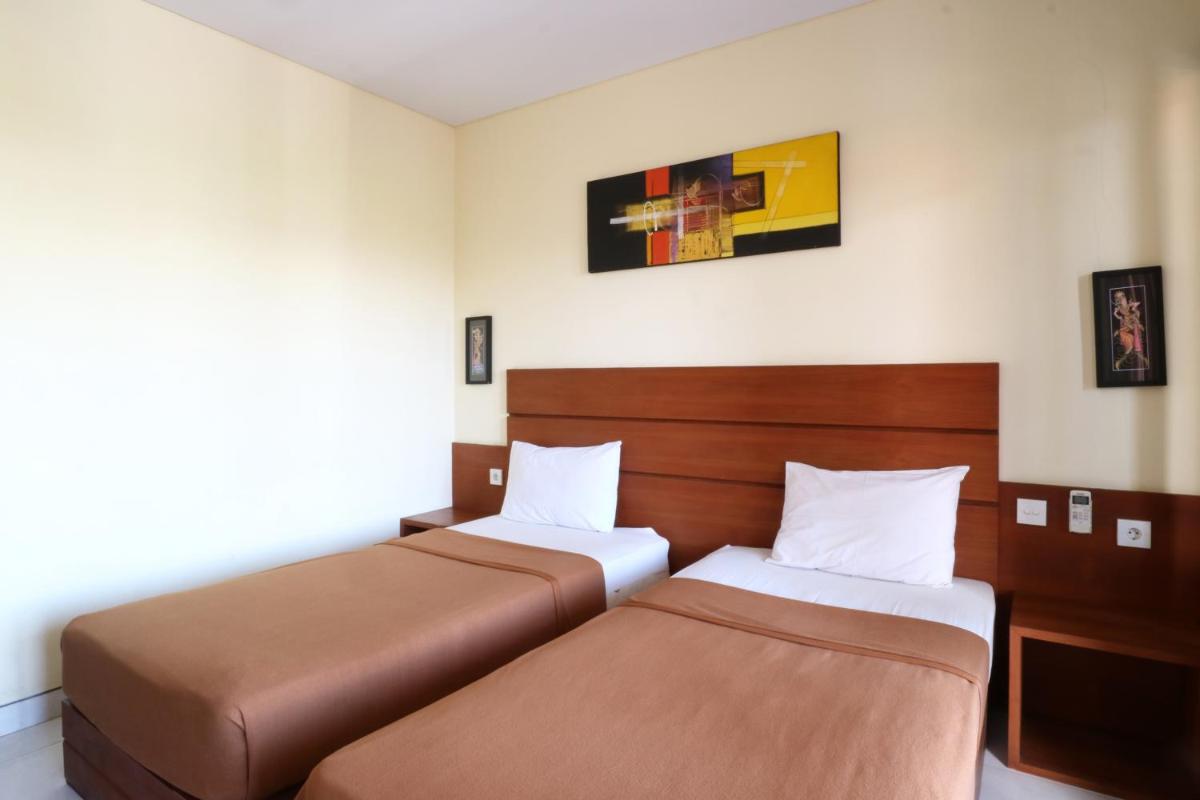 Kondra Premiere Guest House Kuta - Housity