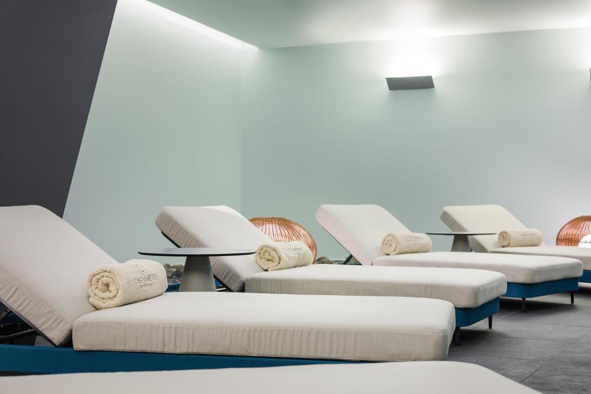 Uma área de estar em Castanheiro Boutique Hotel