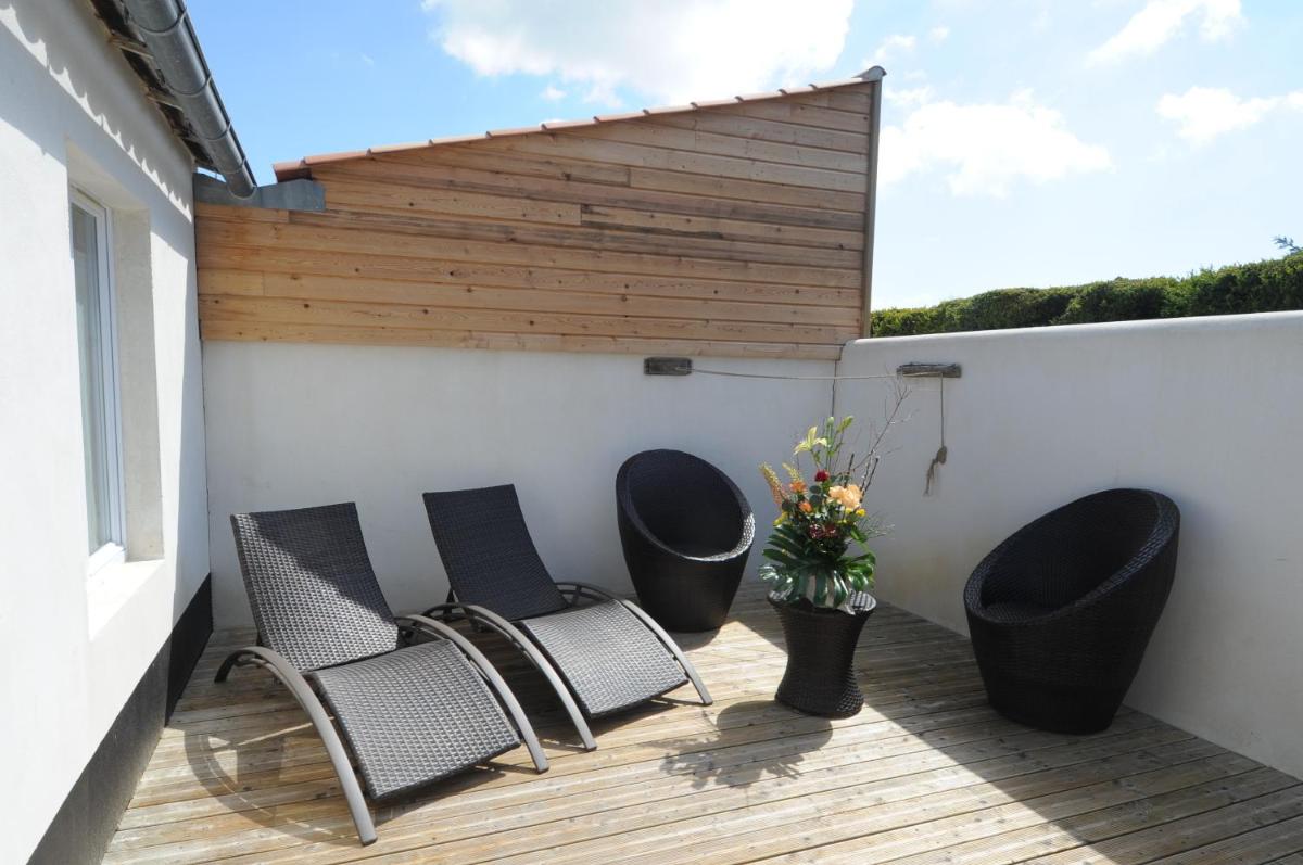 Balcon ou terrasse dans l'établissement Elégance Suites Hôtel