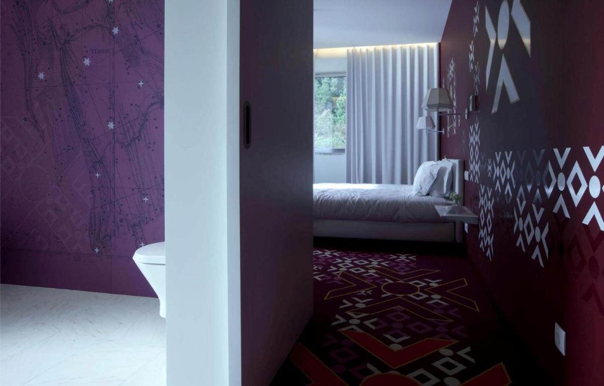 Uma cama ou camas num quarto em HD