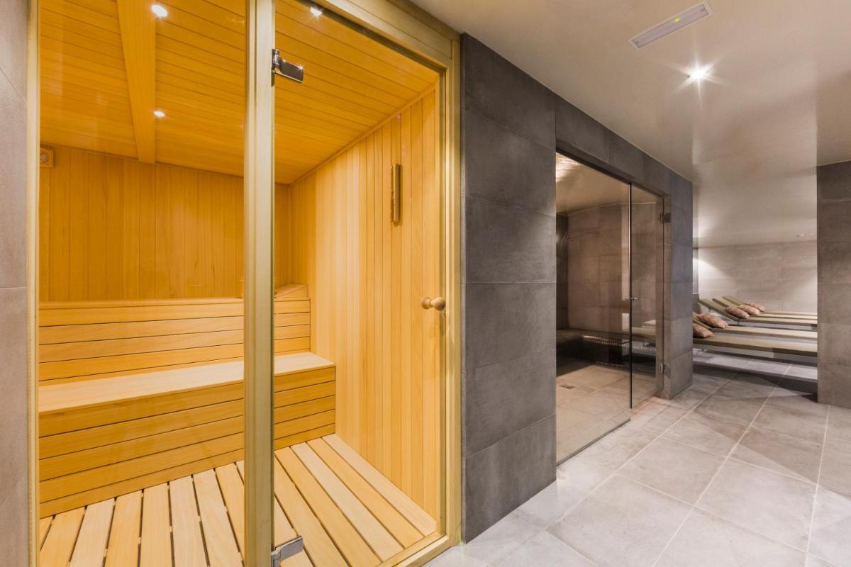 Cama o camas de una habitación en Catalonia Granada