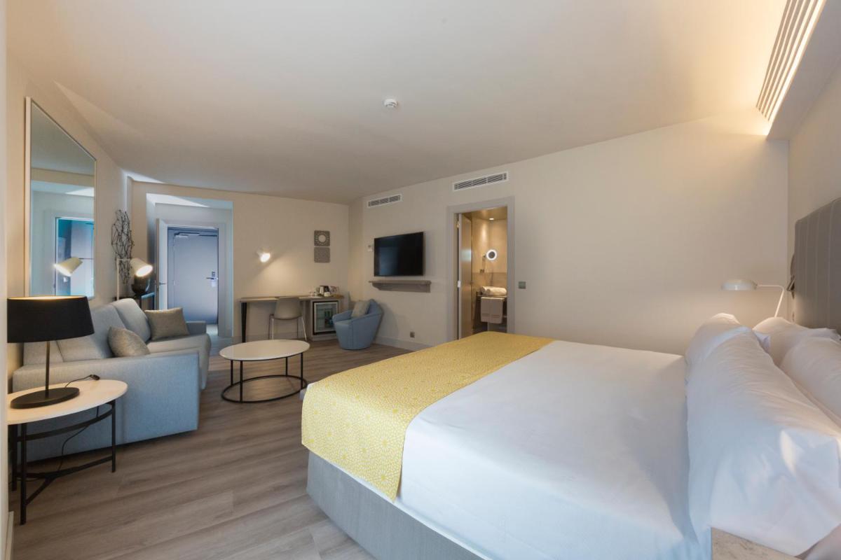Cama o camas de una habitación en Catalonia Granada