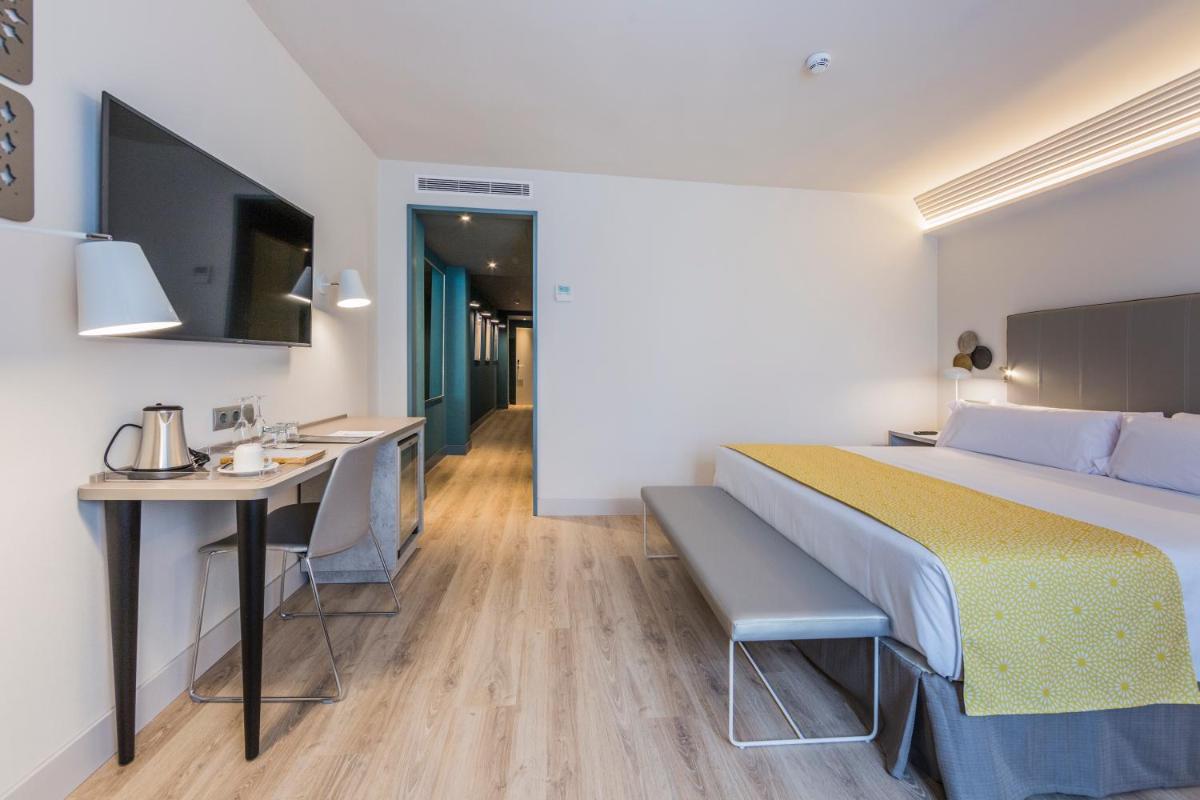 Cama o camas de una habitación en Catalonia Granada