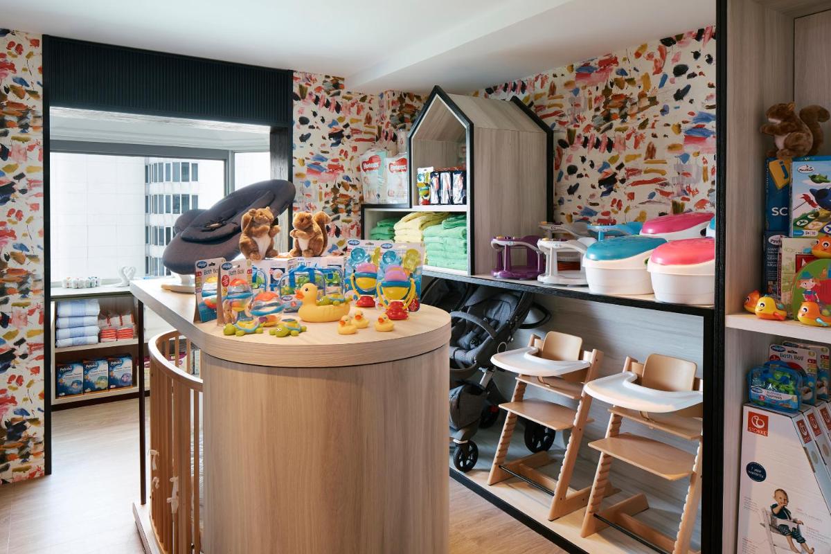 a childs play room with a bar with drinks on it at Shangri-La Singapore in Singapore a childs play room with a bar with drinks on it at Shangri-La Singapore in Singapore