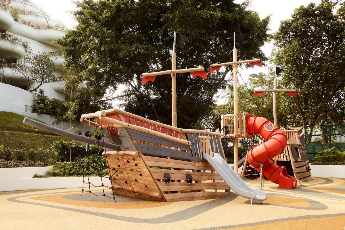 a playground with a slide and a slideintend at Shangri-La Singapore in Singapore