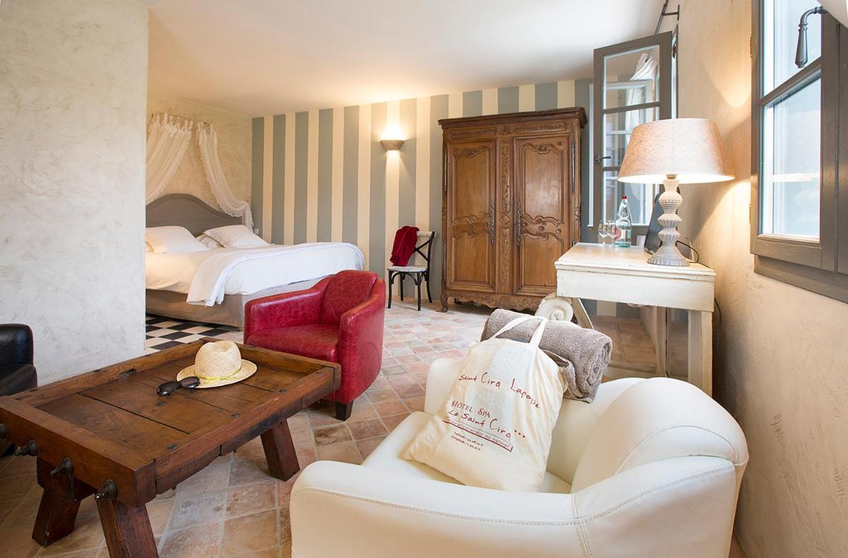 Coin salon dans l'établissement Hôtel-Spa Le Saint Cirq