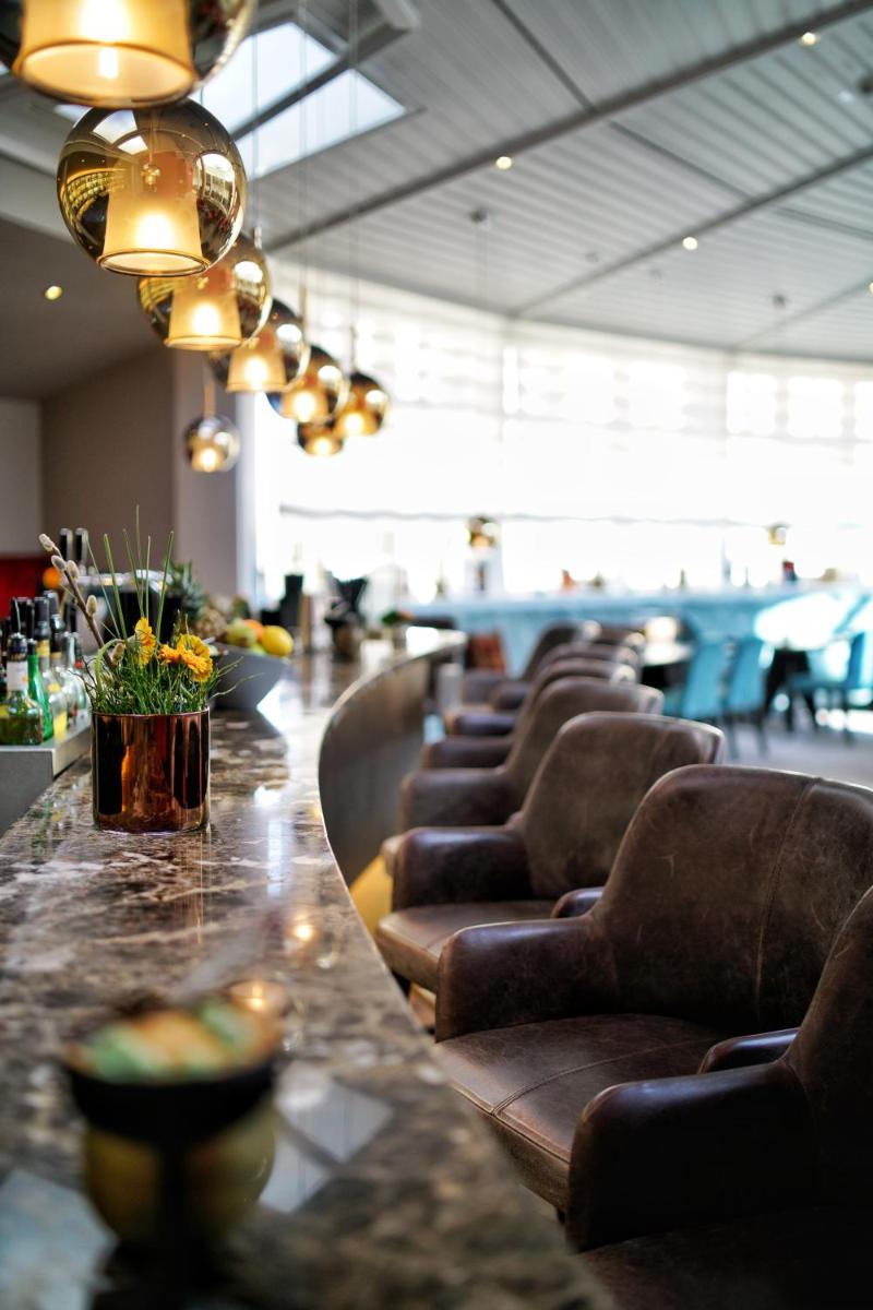 Ein Sitzbereich in der Unterkunft VILA VITA Rosenpark Ein Sitzbereich in der Unterkunft VILA VITA Rosenpark