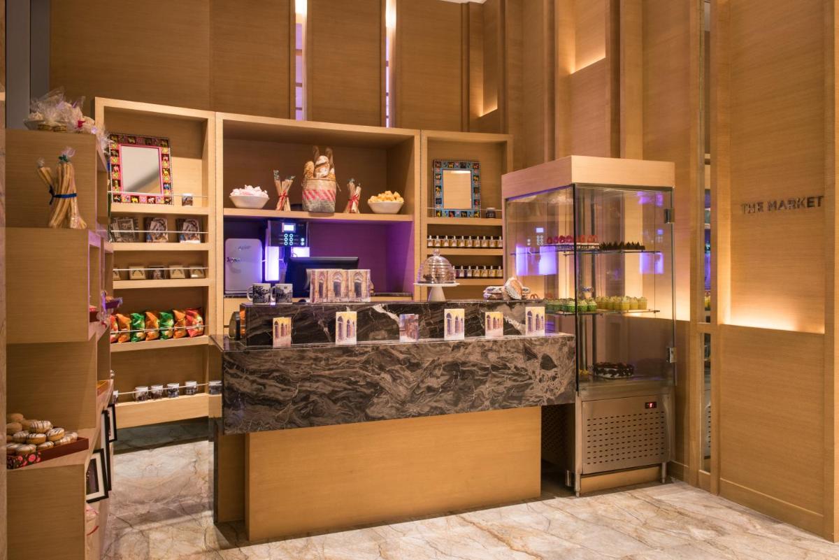 a cosmetics shop with a counter in a room at Hyatt Regency Lucknow Gomti Nagar in Lucknow