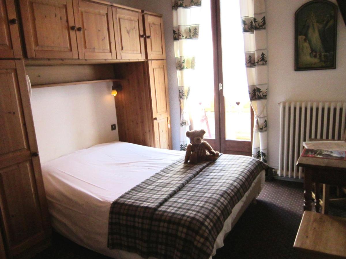 Un ou plusieurs lits dans un hébergement de l'établissement Logis Hotel Gai Soleil