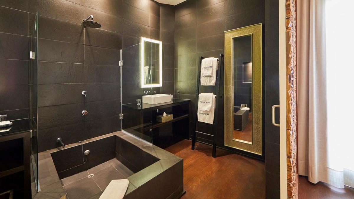 Un baño de Puro Hotel Oasis Urbano