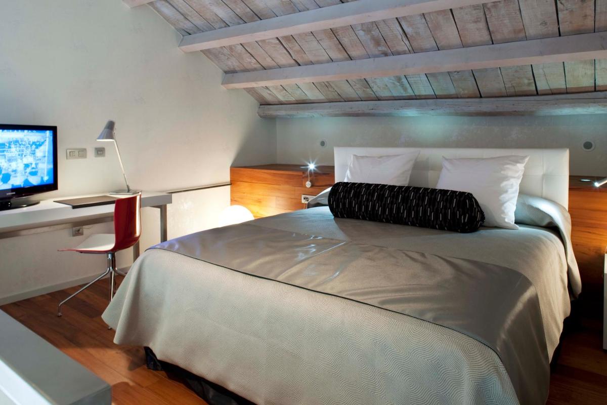 Cama o camas de una habitación en Hotel AF Pesquera