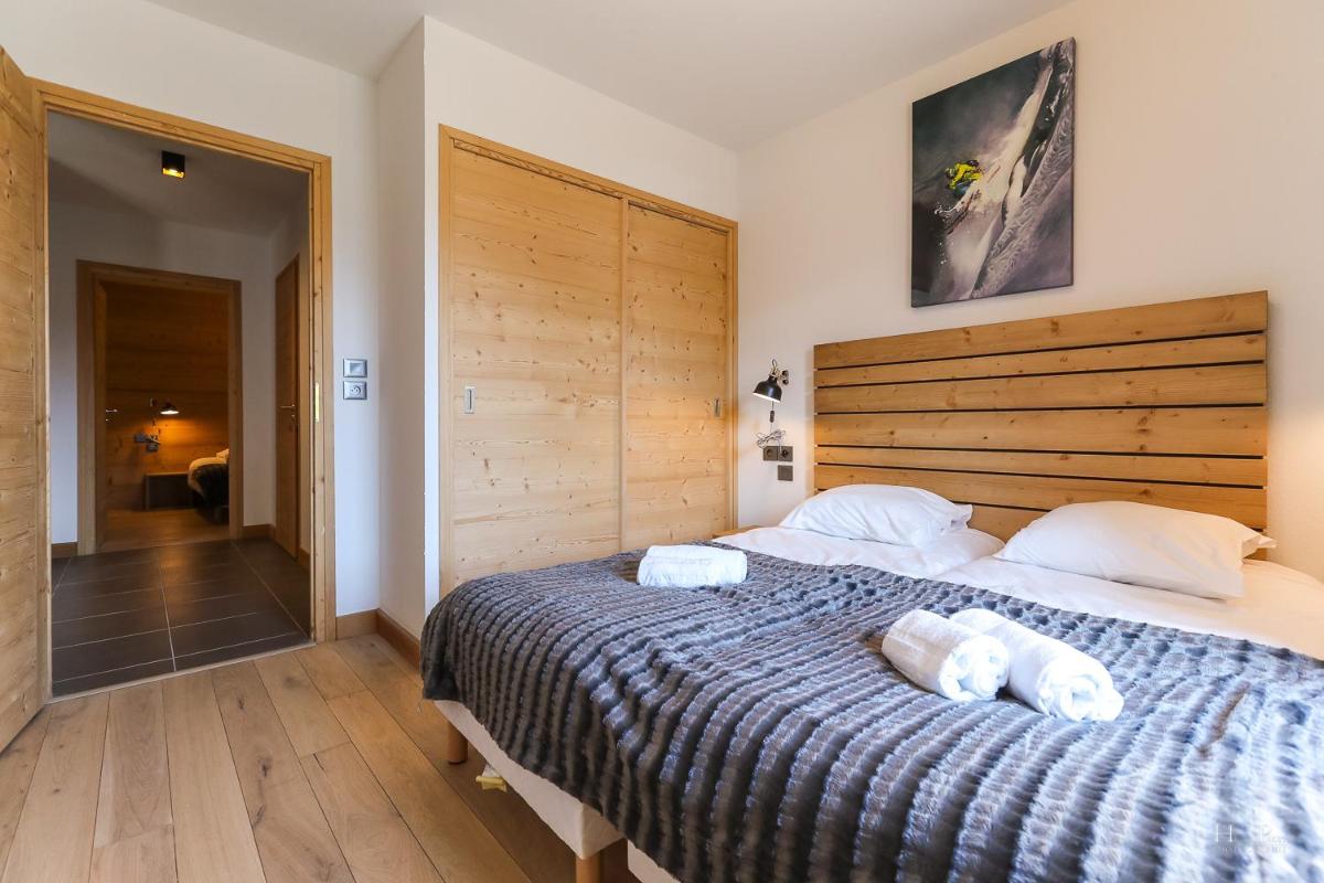 Un ou plusieurs lits dans un hébergement de l'établissement TERRESENS - Les Fermes du Mont-Blanc