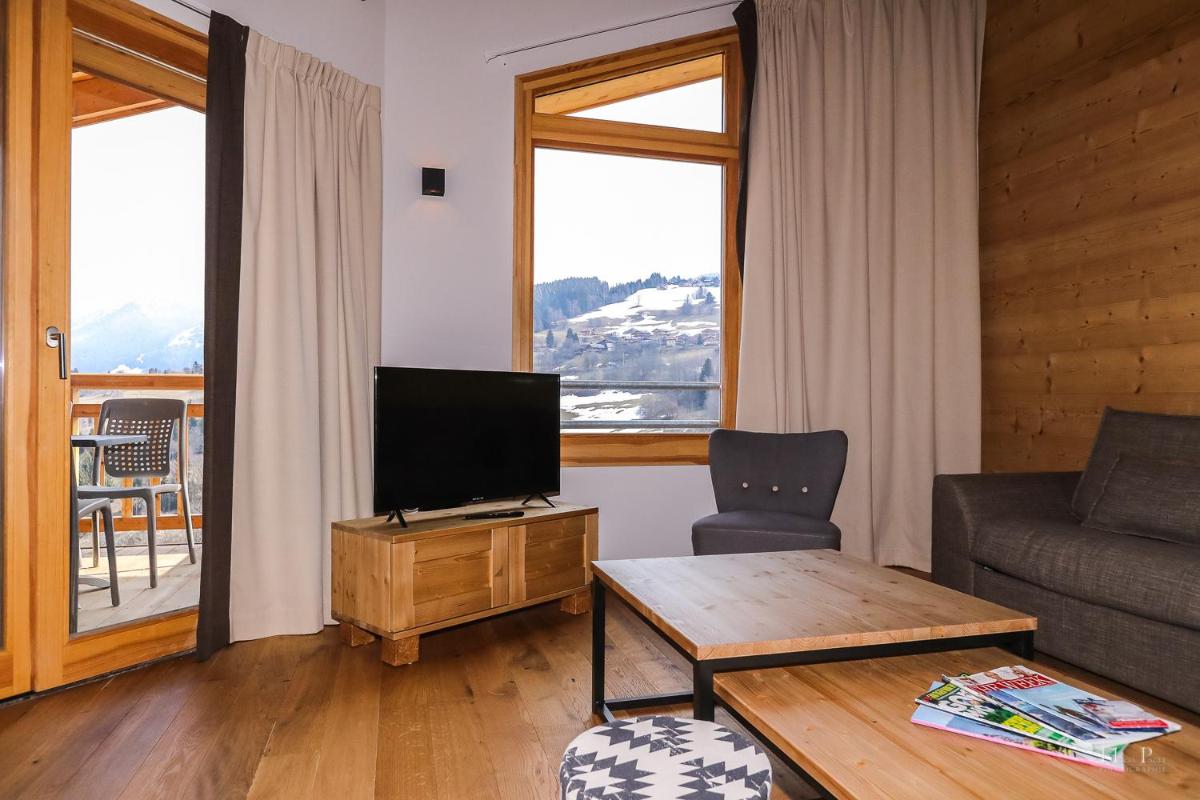 Télévision ou salle de divertissement dans l'établissement TERRESENS - Les Fermes du Mont-Blanc
