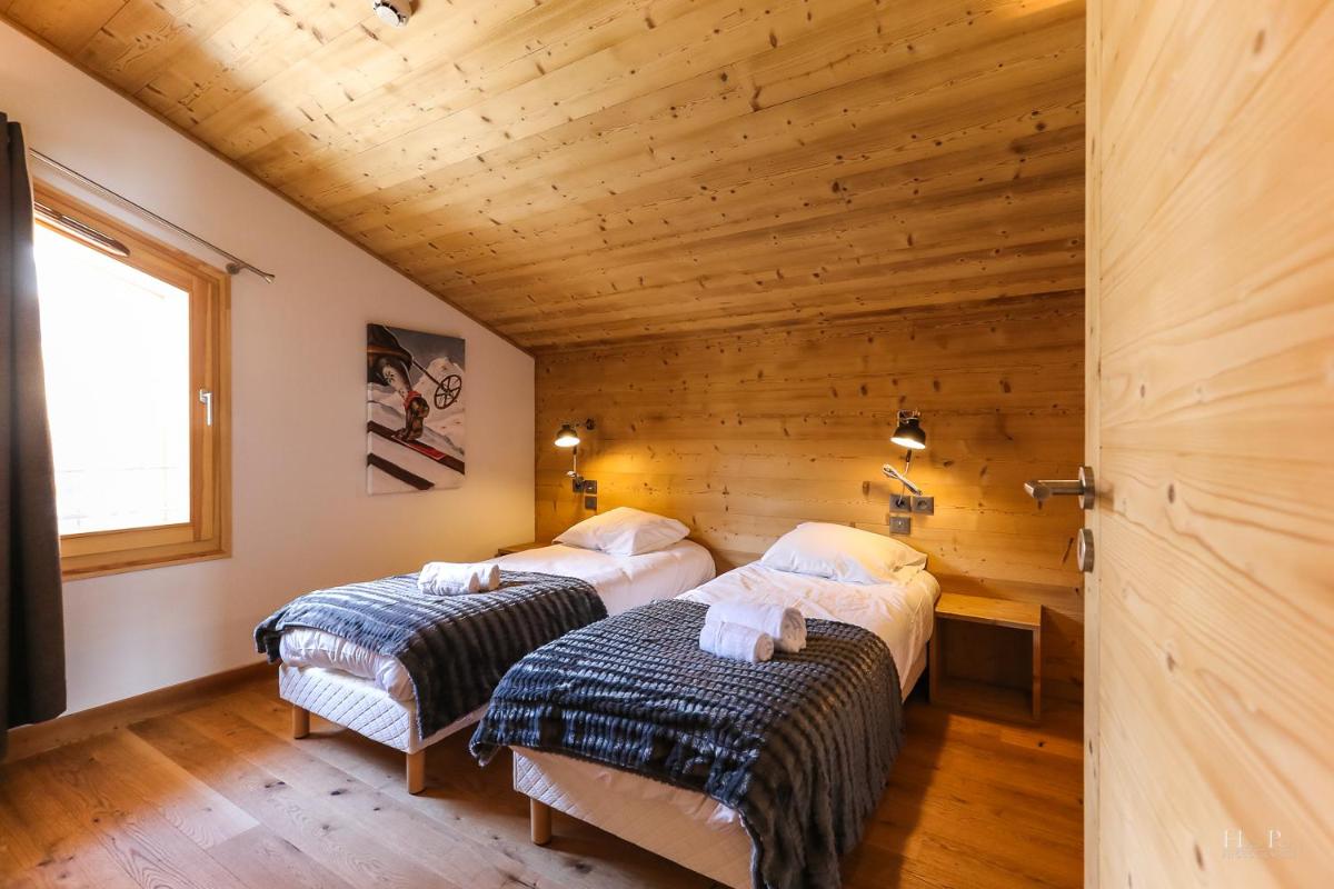 Un ou plusieurs lits dans un hébergement de l'établissement TERRESENS - Les Fermes du Mont-Blanc