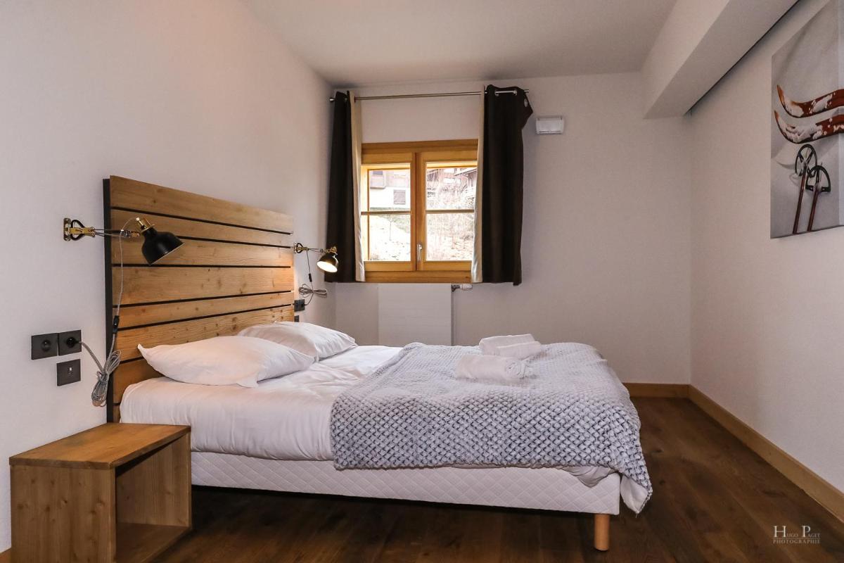 Un ou plusieurs lits dans un hébergement de l'établissement TERRESENS - Les Fermes du Mont-Blanc
