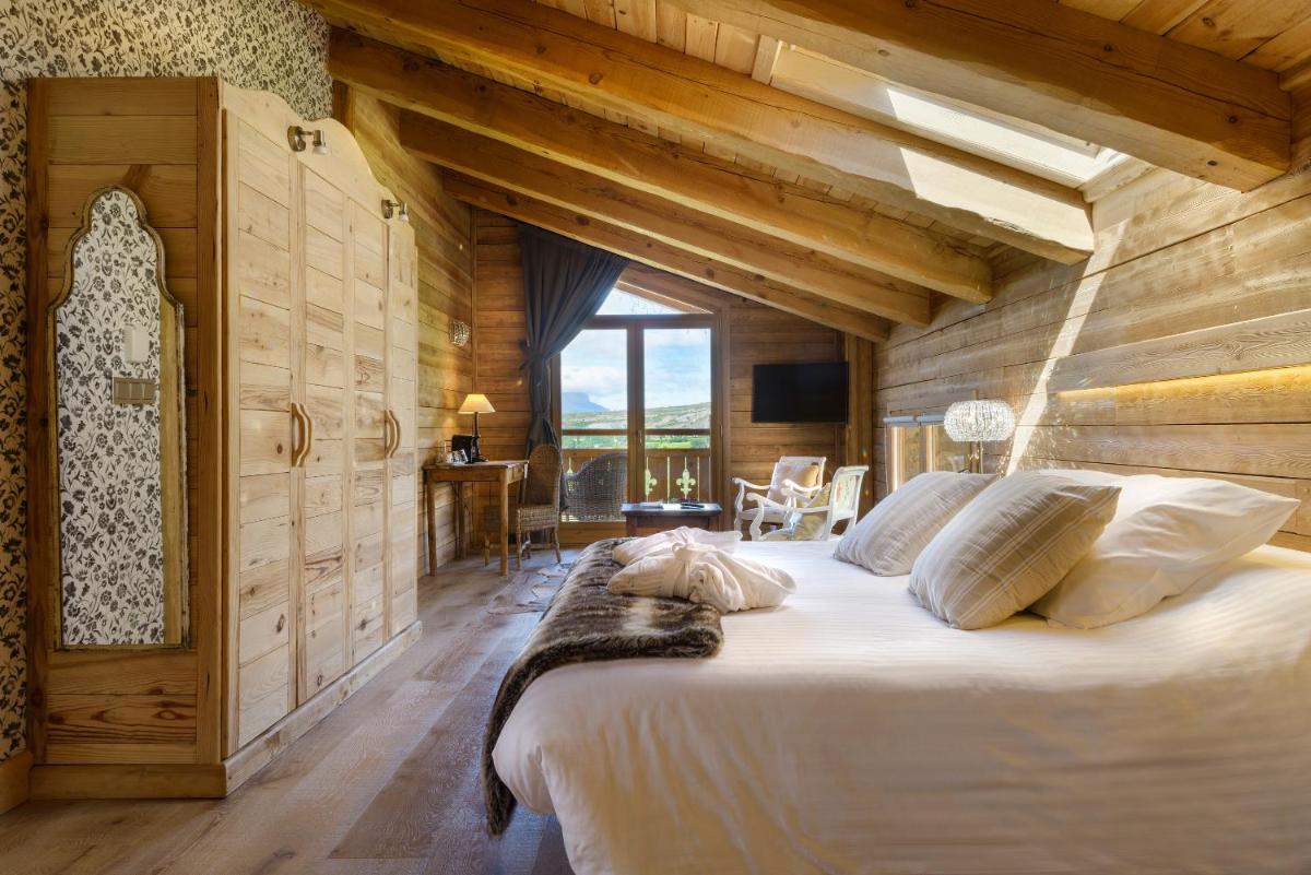 Cama o camas de una habitación en Hotel Viñas de Lárrede