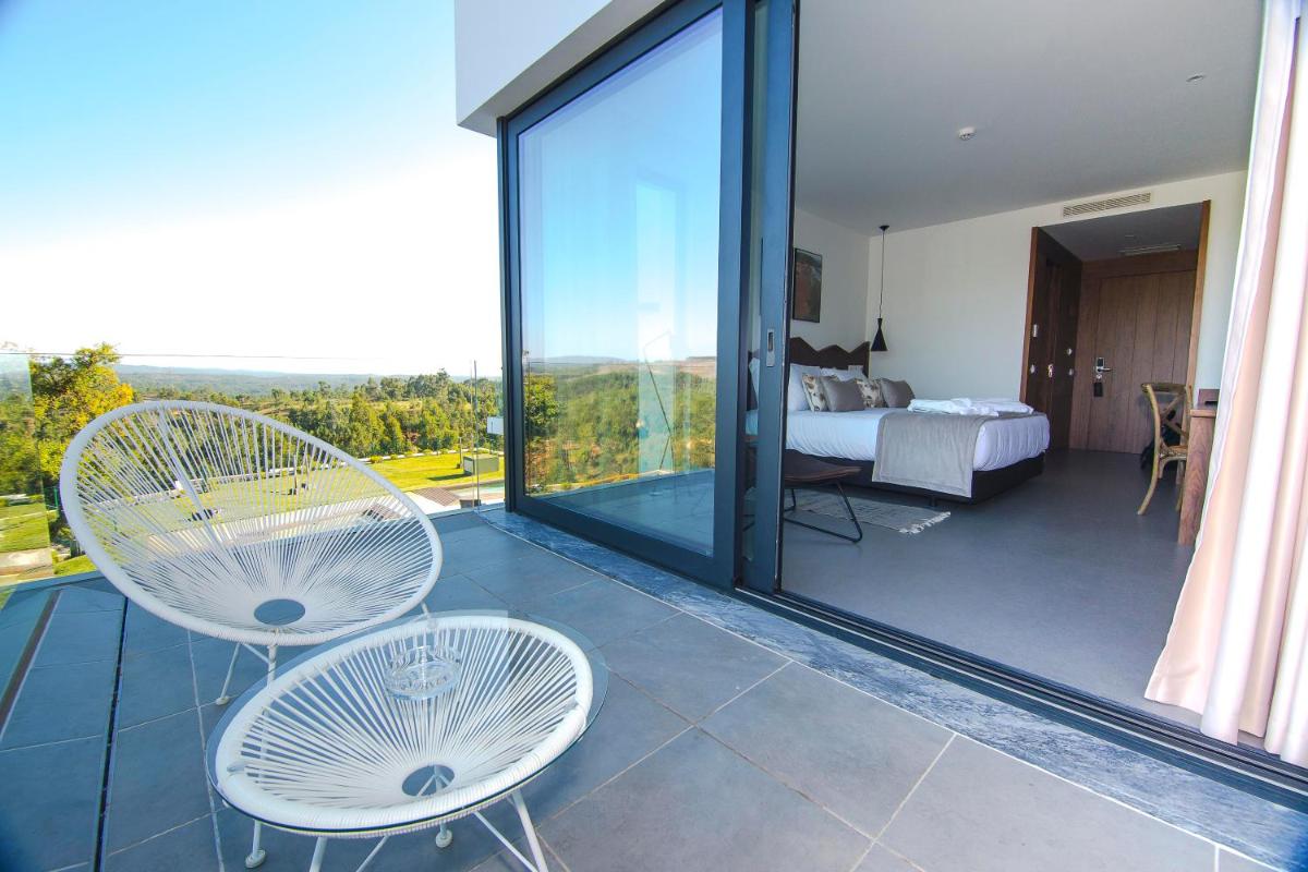 Uma varanda ou terraço em Enigma - Nature & Water Hotel