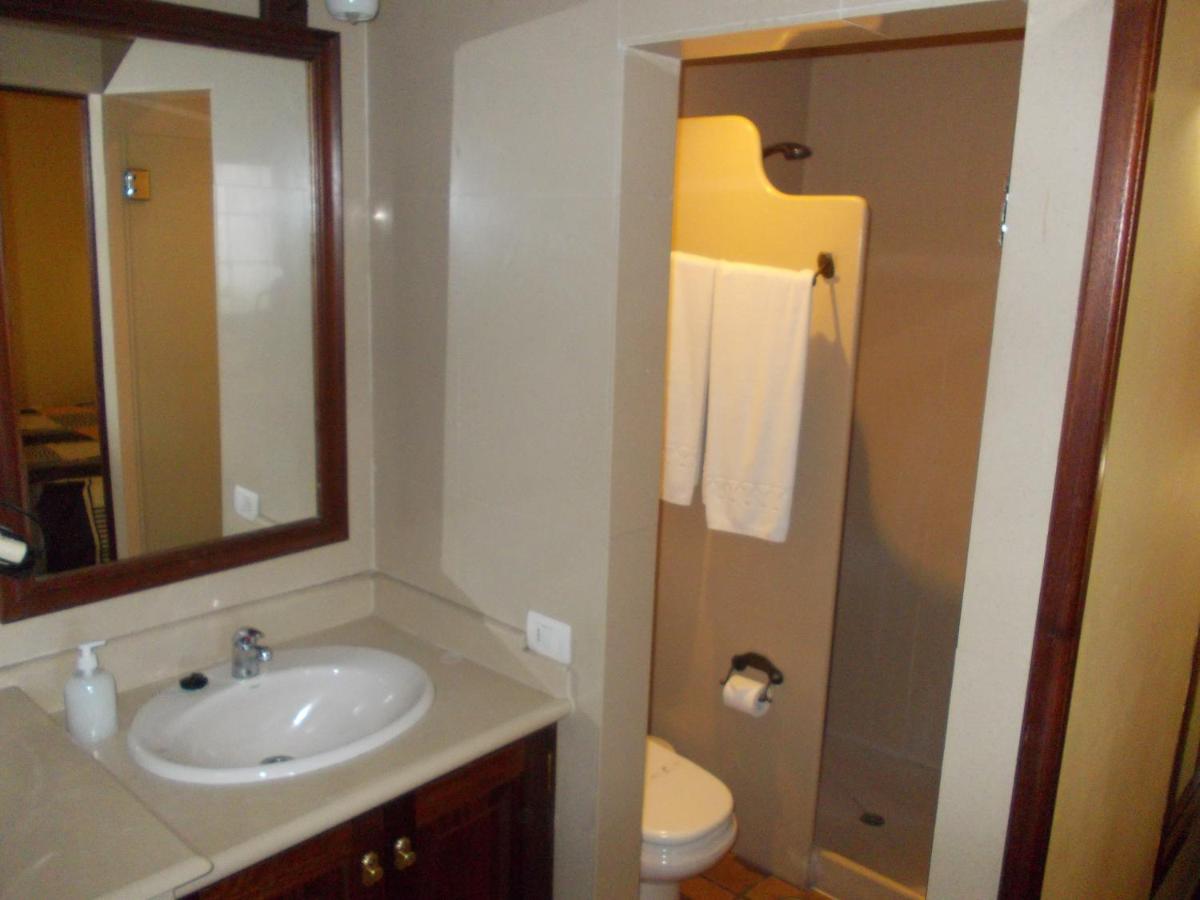 Un baño de Hotel La Palma Romántica