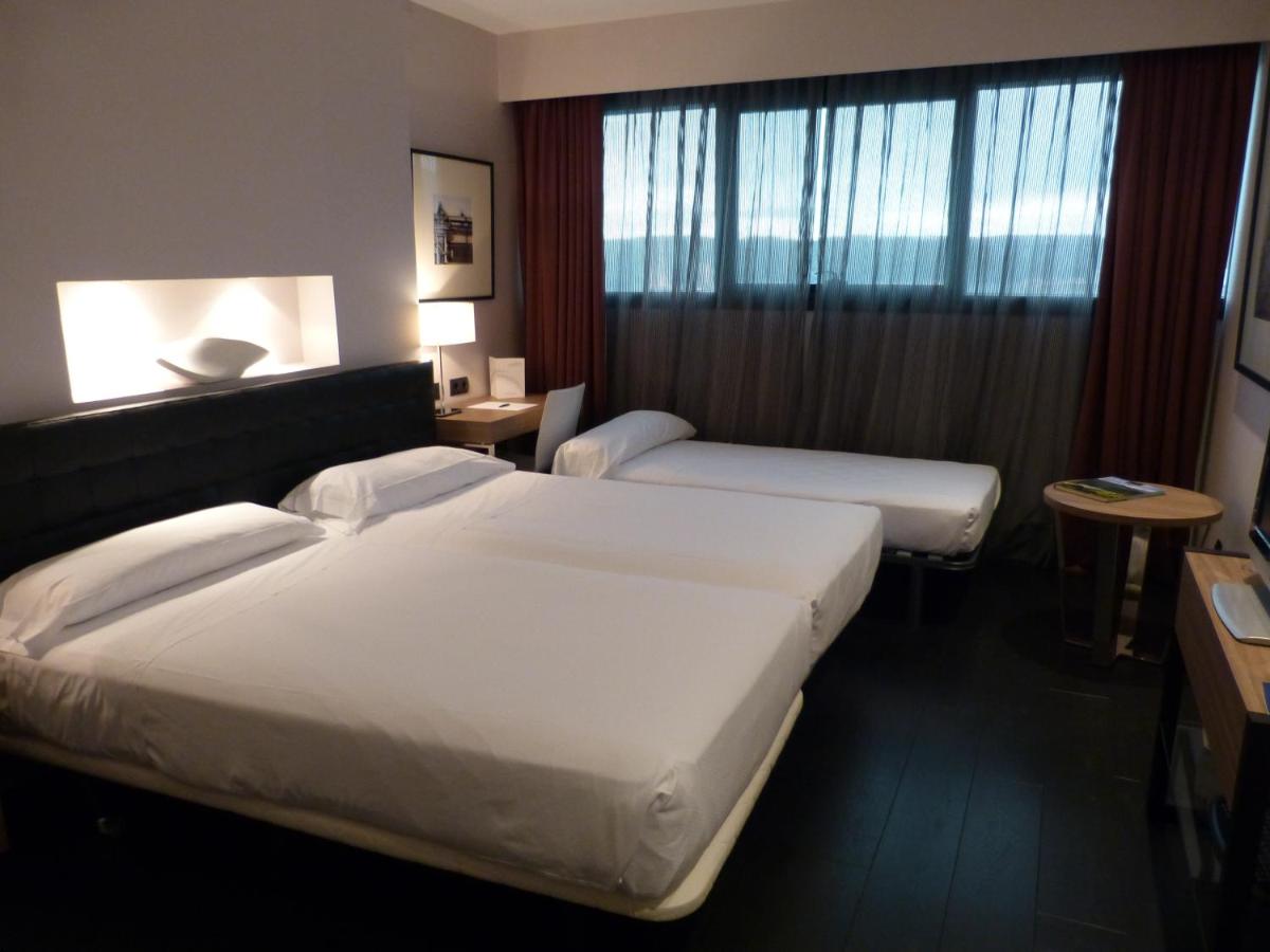 Cama o camas de una habitación en URH Hotel Spa Zen Balagares