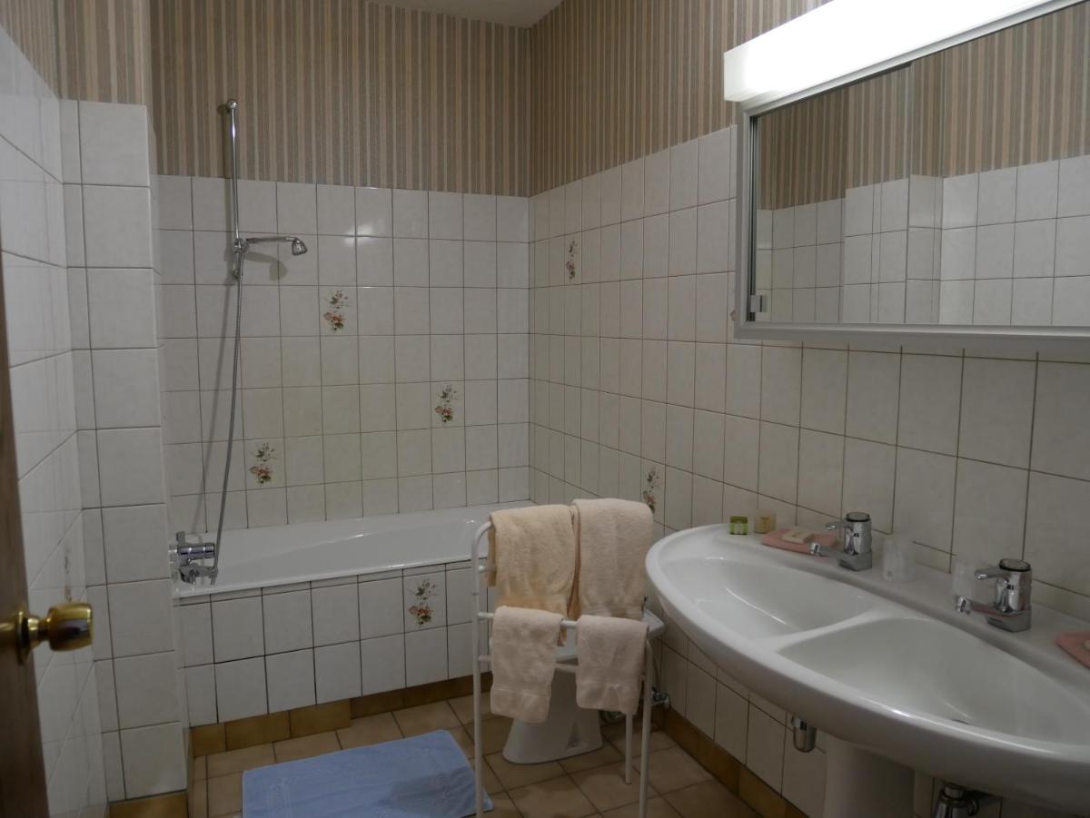 Salle de bains dans l'établissement Hotel-Spa & Restaurant Logis Domaine Langmatt