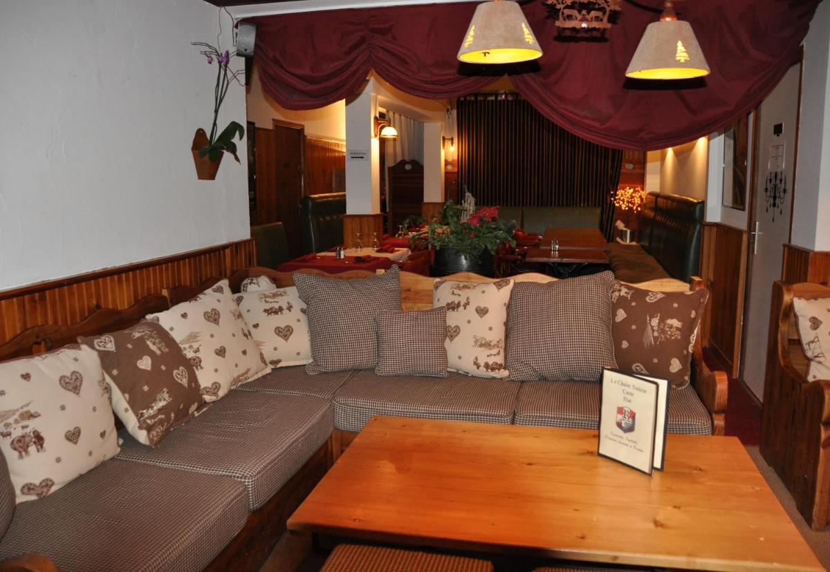 Coin salon dans l'établissement Le Chalet Suisse