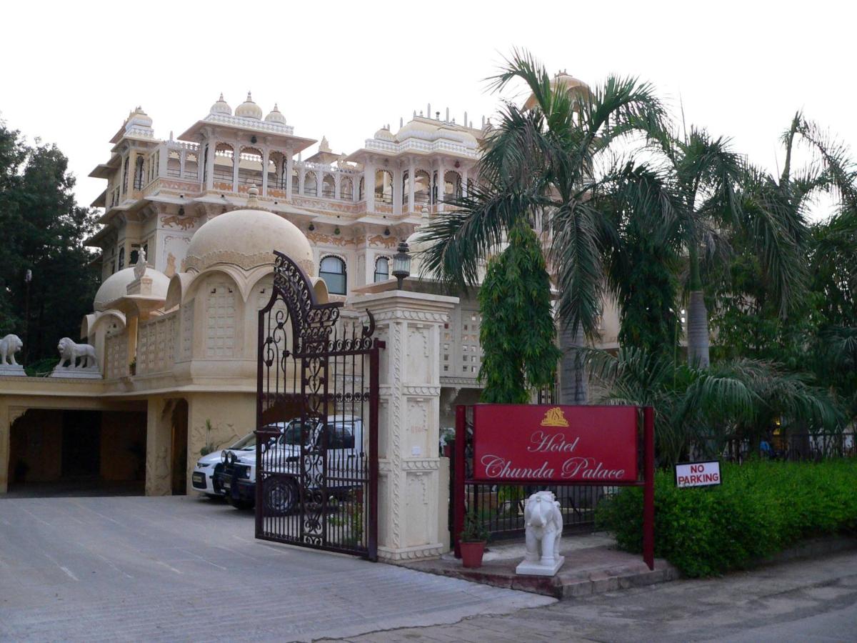 a large building with a gate in front of it at Chunda Palace in Udaipur