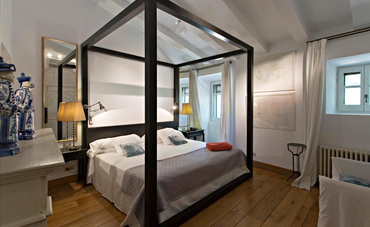 Cama o camas de una habitación en Hotel La Malcontenta