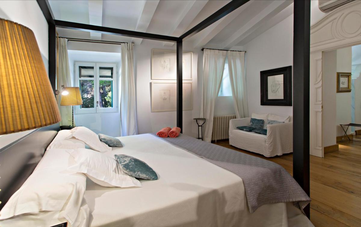 Cama o camas de una habitación en Hotel La Malcontenta