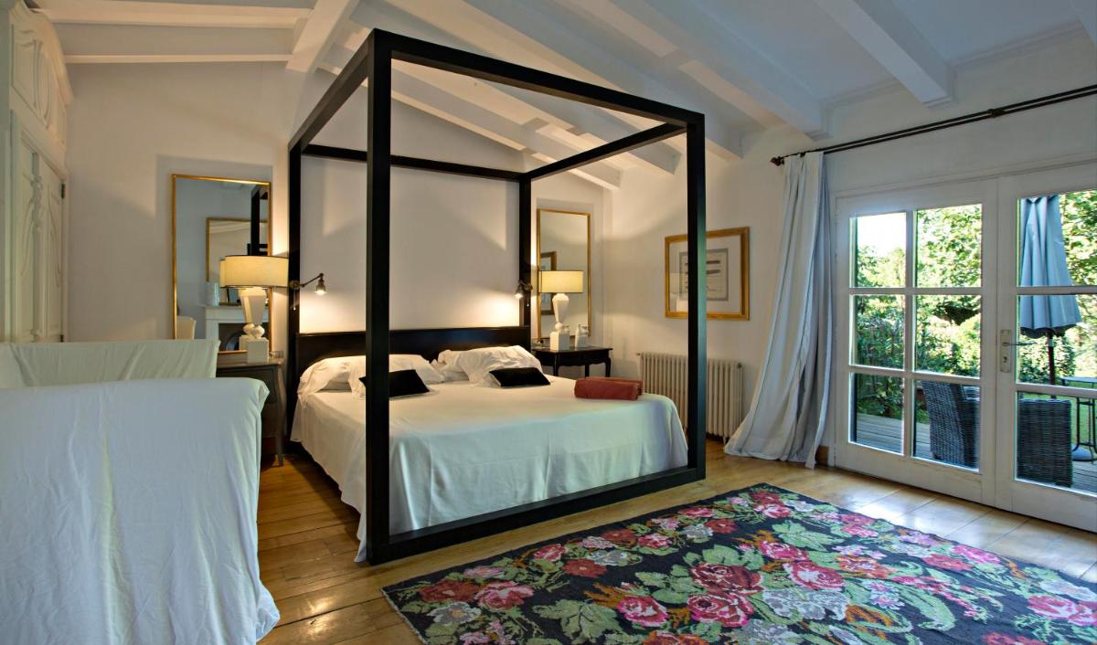 Cama o camas de una habitación en Hotel La Malcontenta