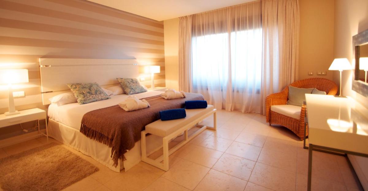 Cama o camas de una habitación en Aparthotel Novo Resort